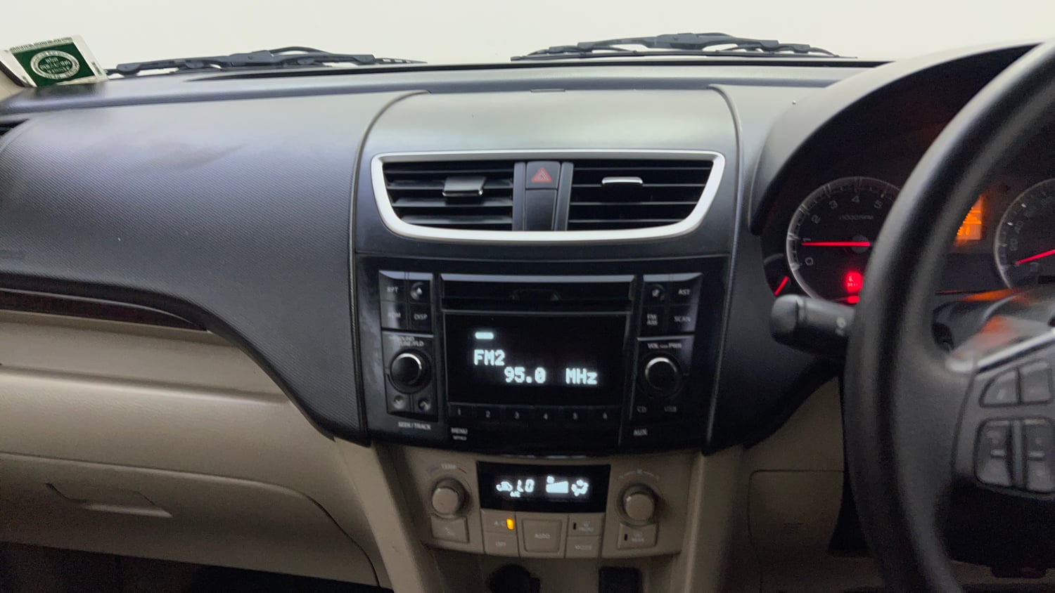 Used 2012 Maruti Suzuki Swift Dzire ZXI Petrol Manual top_features Integrated (in-dash) music system
