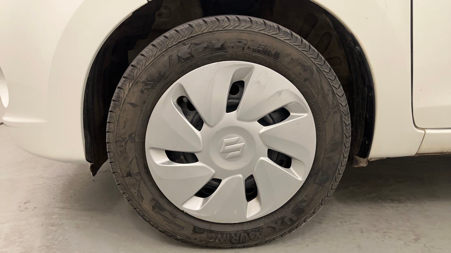 Used 2017 Maruti Suzuki Celerio VXi AMT Petrol Automatic tyres LEFT FRONT TYRE RIM VIEW