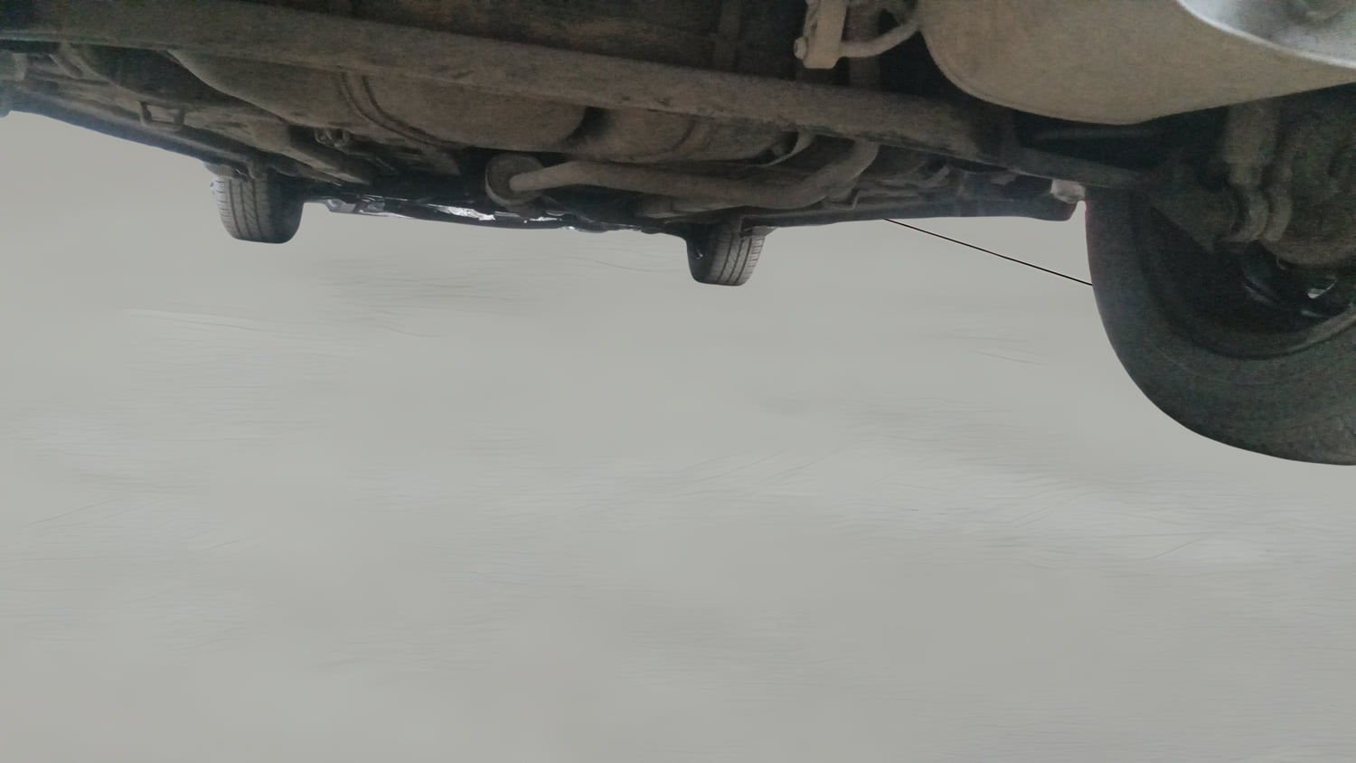 Used 2021 Maruti Suzuki Celerio ZXi AMT Petrol Automatic extra REAR RIGHT UNDERBODY VIEW