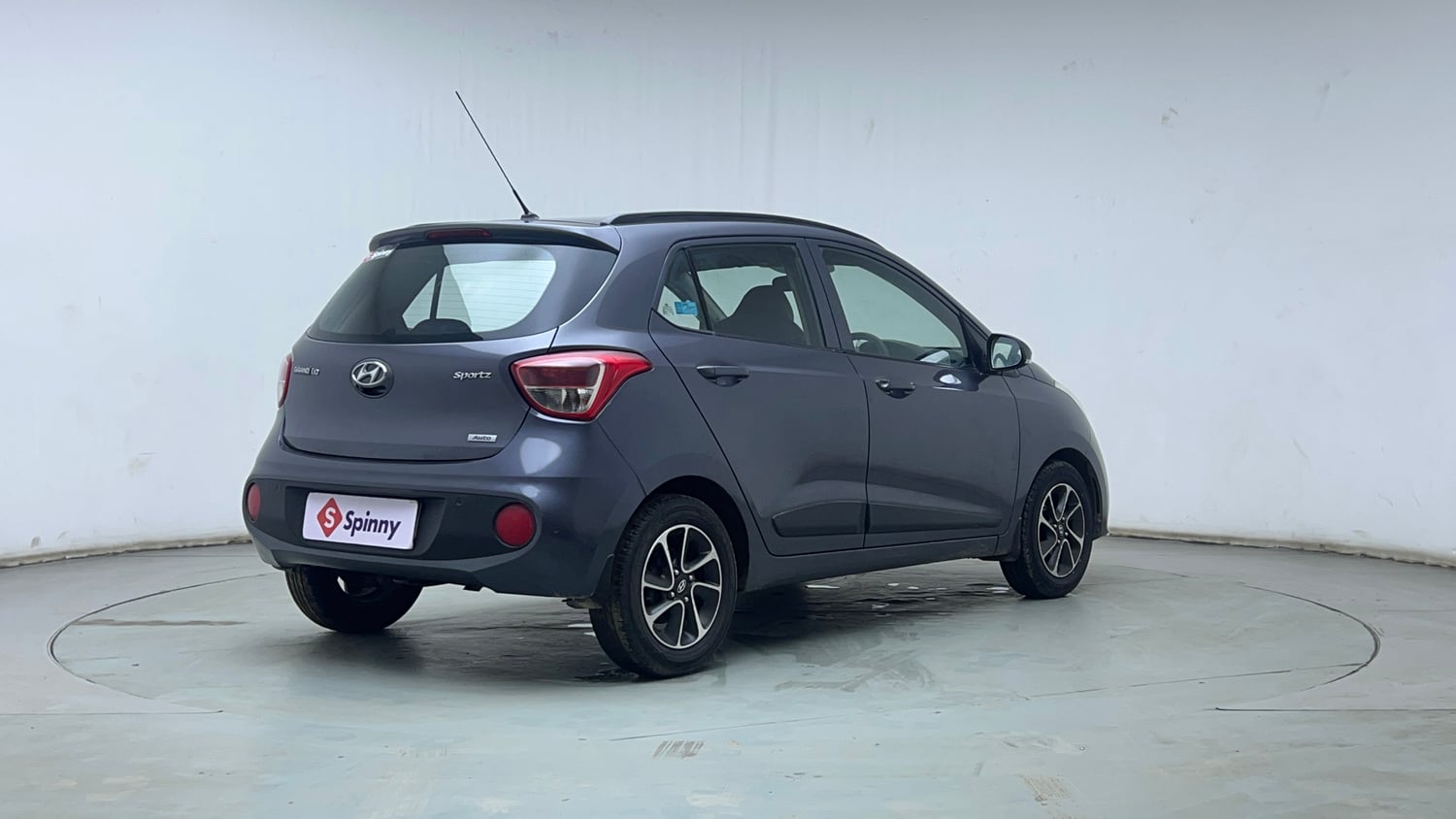 Used 2017 Hyundai Grand i10 Sportz (O) AT 1.2 Kappa VTVT Petrol Automatic exterior RIGHT REAR CORNER VIEW
