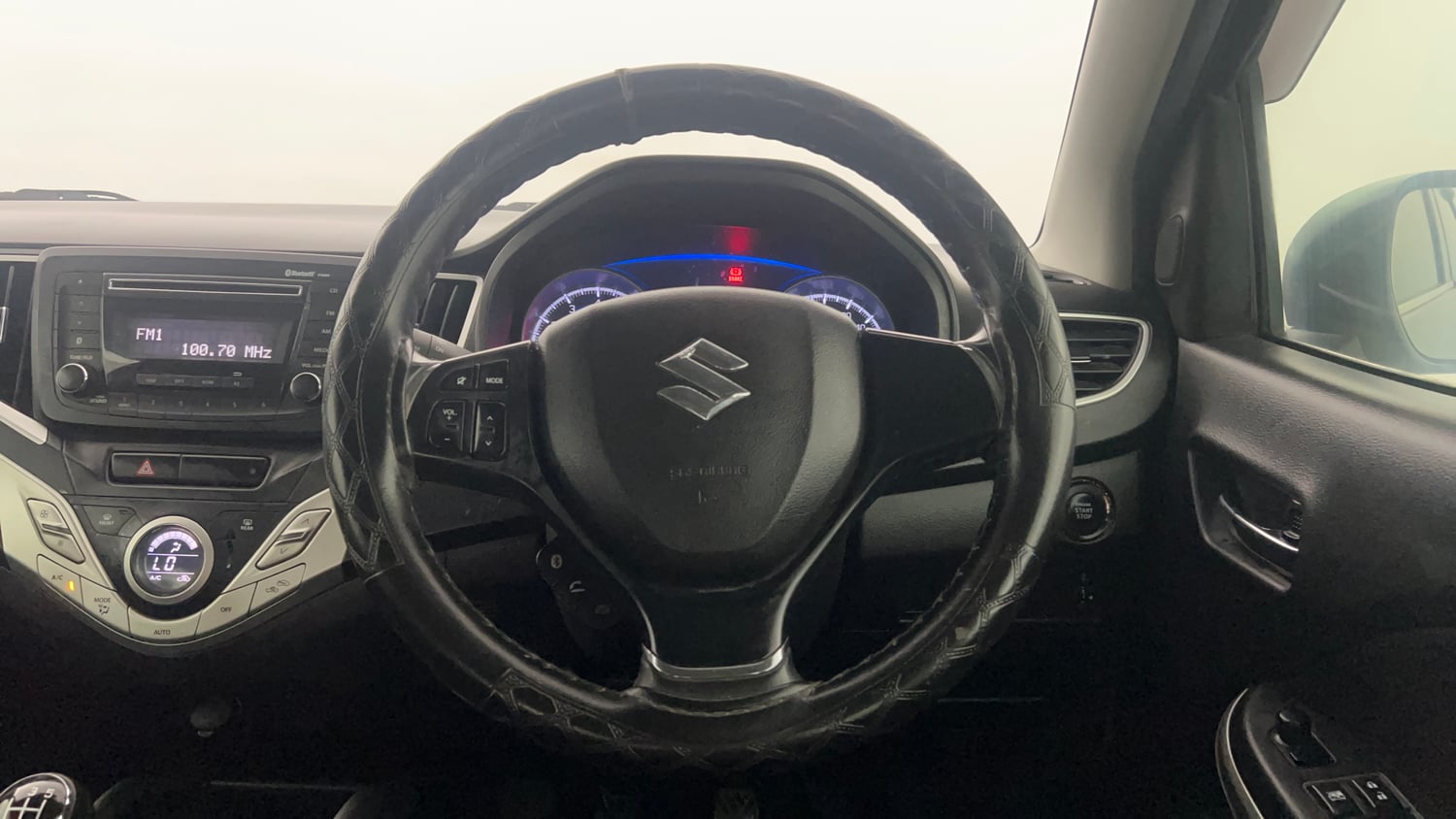 Used 2017 Maruti Suzuki Baleno Zeta 1.2 Petrol Manual interior STEERING VIEW