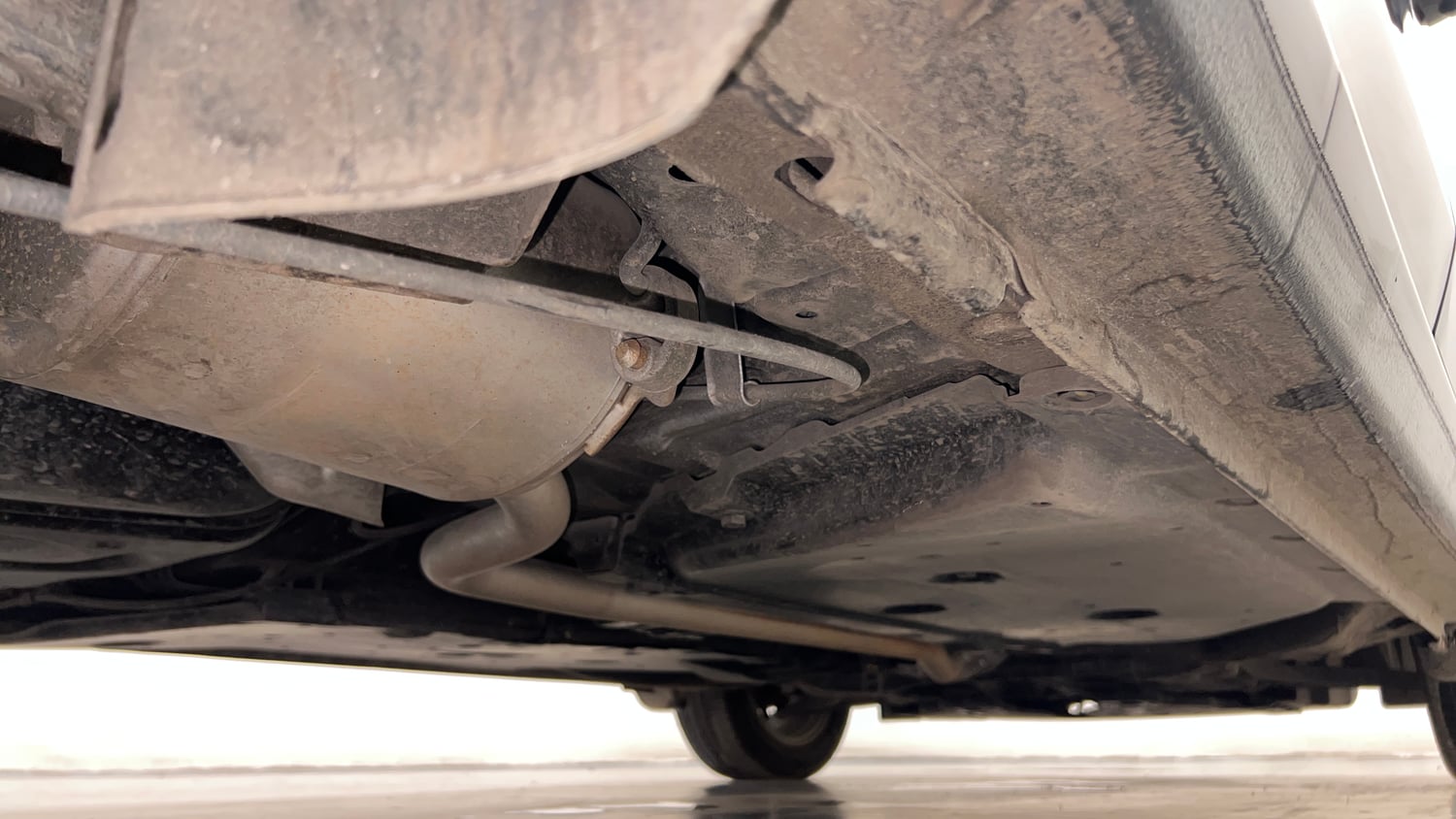 Used 2025 Honda Amaze VX 1.2 Petrol CVT Petrol Automatic extra REAR RIGHT UNDERBODY VIEW