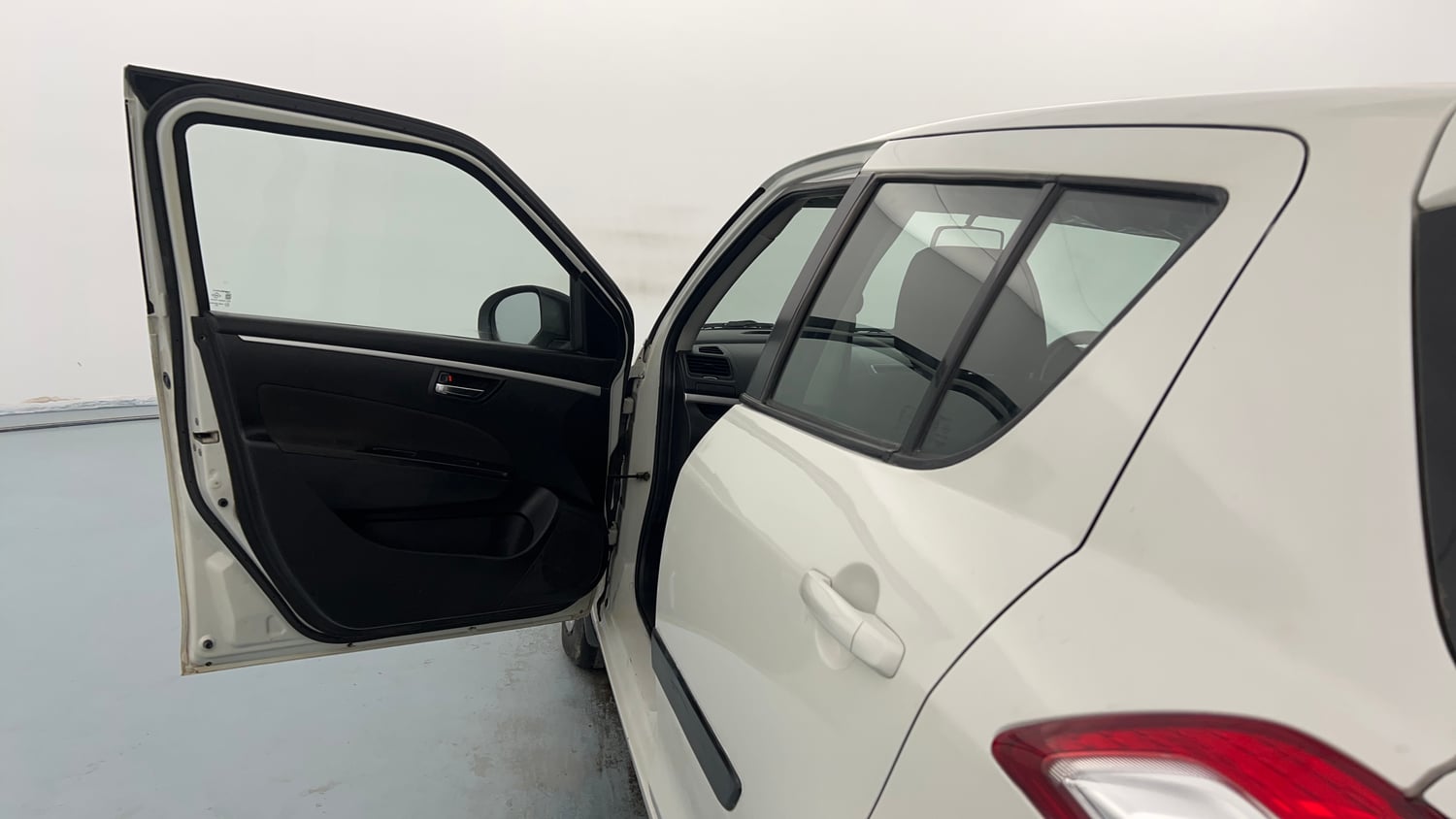 Used 2016 Maruti Suzuki Swift VDi Diesel Manual interior LEFT FRONT DOOR OPEN VIEW