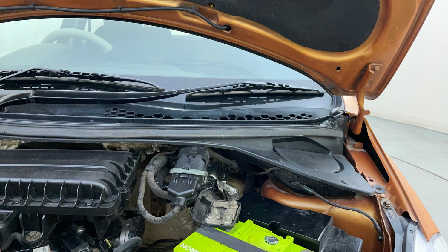 Used 2016 Tata Tiago Revotron XZ Petrol Manual engine ENGINE LEFT SIDE HINGE & APRON VIEW