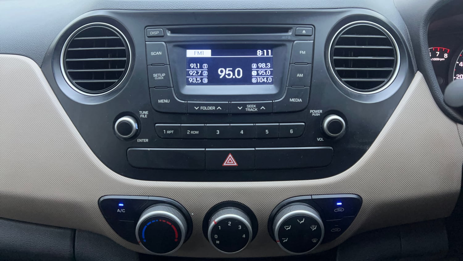 Used 2014 Hyundai Grand i10 Sportz 1.2 Kappa VTVT Petrol Manual interior MUSIC SYSTEM & AC CONTROL VIEW