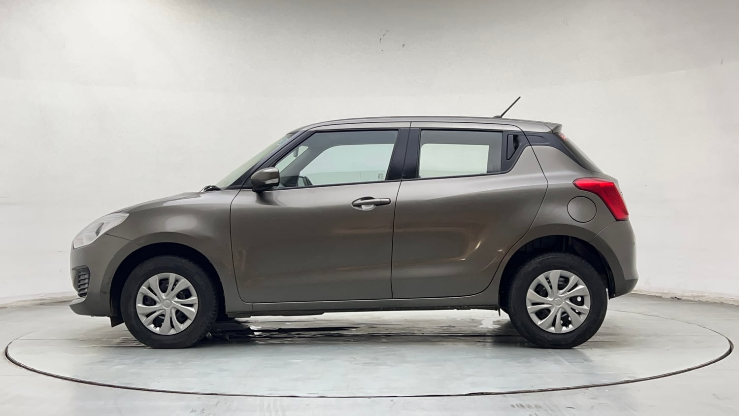 Used 2021 Maruti Suzuki Swift VXi Petrol Manual exterior LEFT SIDE VIEW