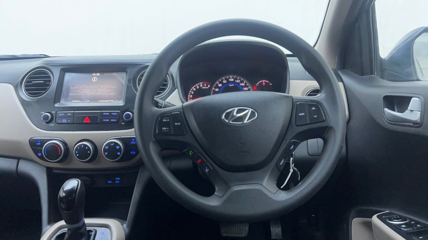 Used 2017 Hyundai Grand i10 Sportz (O) AT 1.2 Kappa VTVT Petrol Automatic interior STEERING VIEW