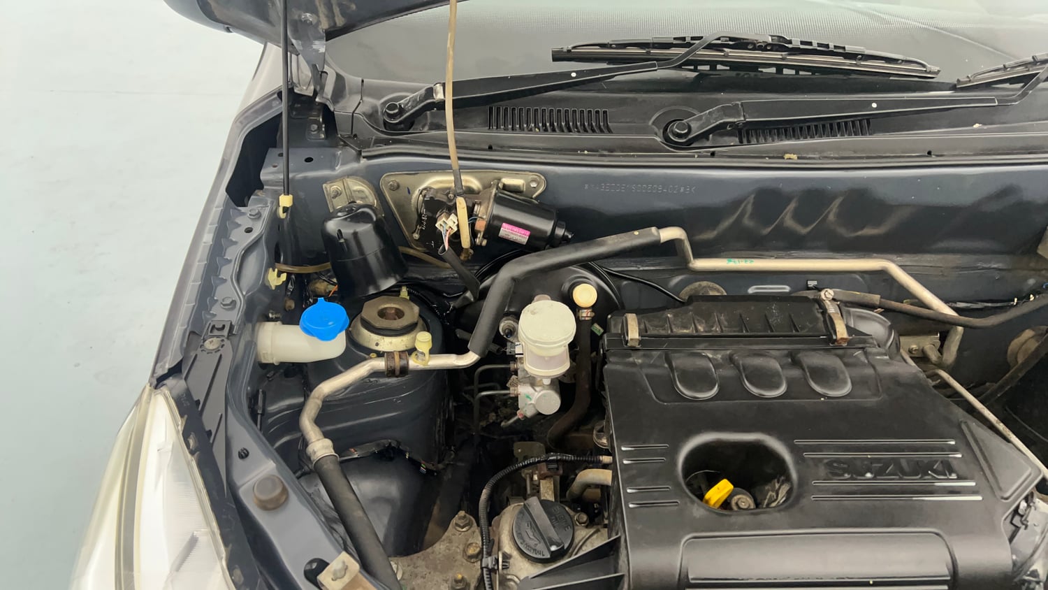 Used 2019 maruti-suzuki Alto K10 VXi (O) AMT Petrol Automatic engine ENGINE RIGHT SIDE HINGE & APRON VIEW
