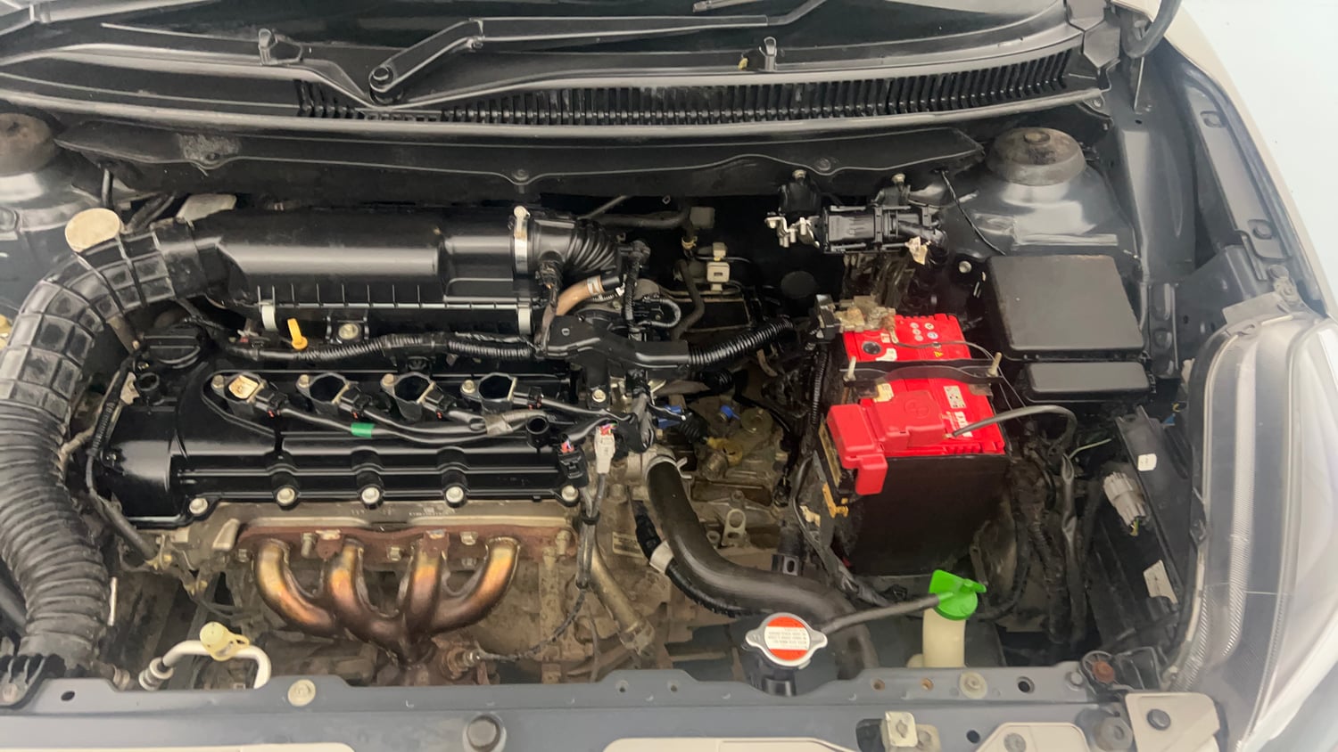 Used 2019 Maruti Suzuki Baleno Delta Petrol Manual engine ENGINE LEFT SIDE VIEW