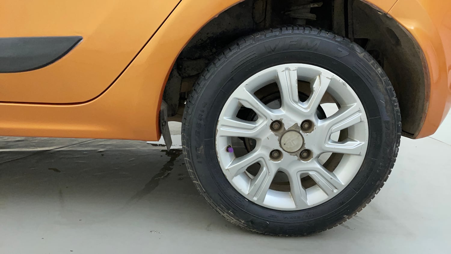 Used 2016 Tata Tiago Revotron XZ Petrol Manual tyres LEFT REAR TYRE RIM VIEW