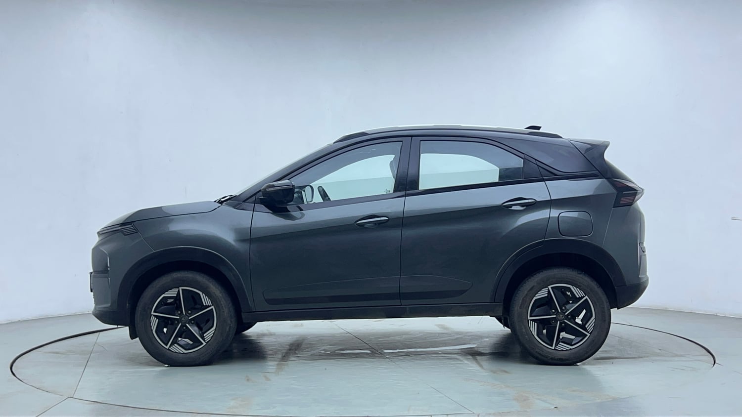 Used 2025 Tata Nexon Fearless Plus S 1.2 Revotron Petrol 7DCA DT Petrol Automatic exterior LEFT SIDE VIEW