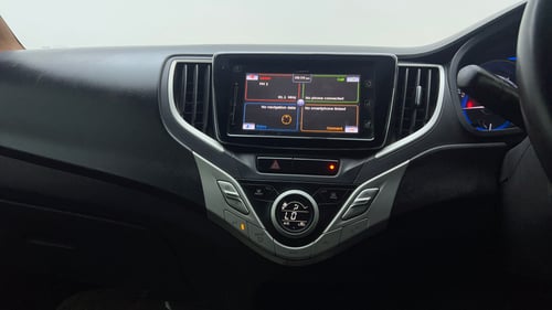 Used 2016 Maruti Suzuki Baleno Alpha 1.2 Petrol Manual interior MUSIC SYSTEM & AC CONTROL VIEW