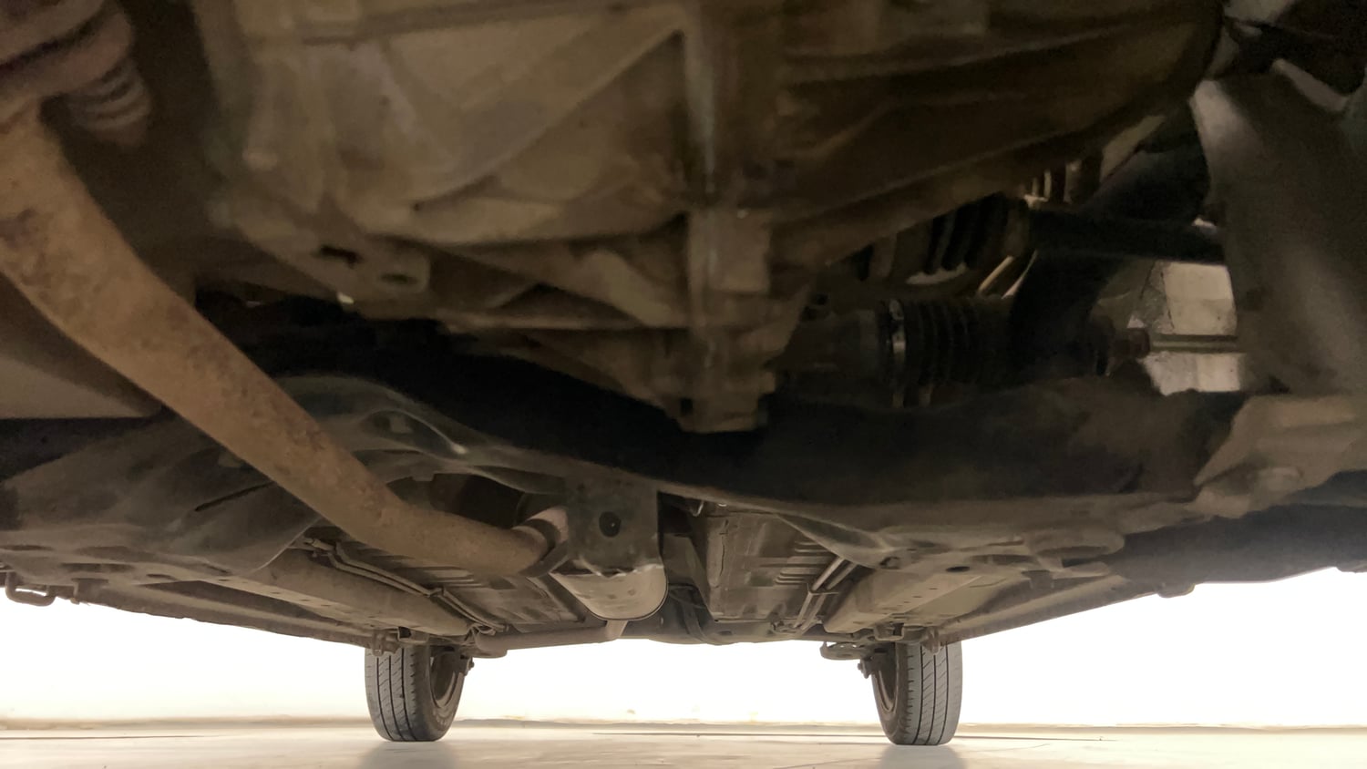 Used 2017 Maruti Suzuki Celerio VXi AMT Petrol Automatic extra FRONT LEFT UNDERBODY VIEW