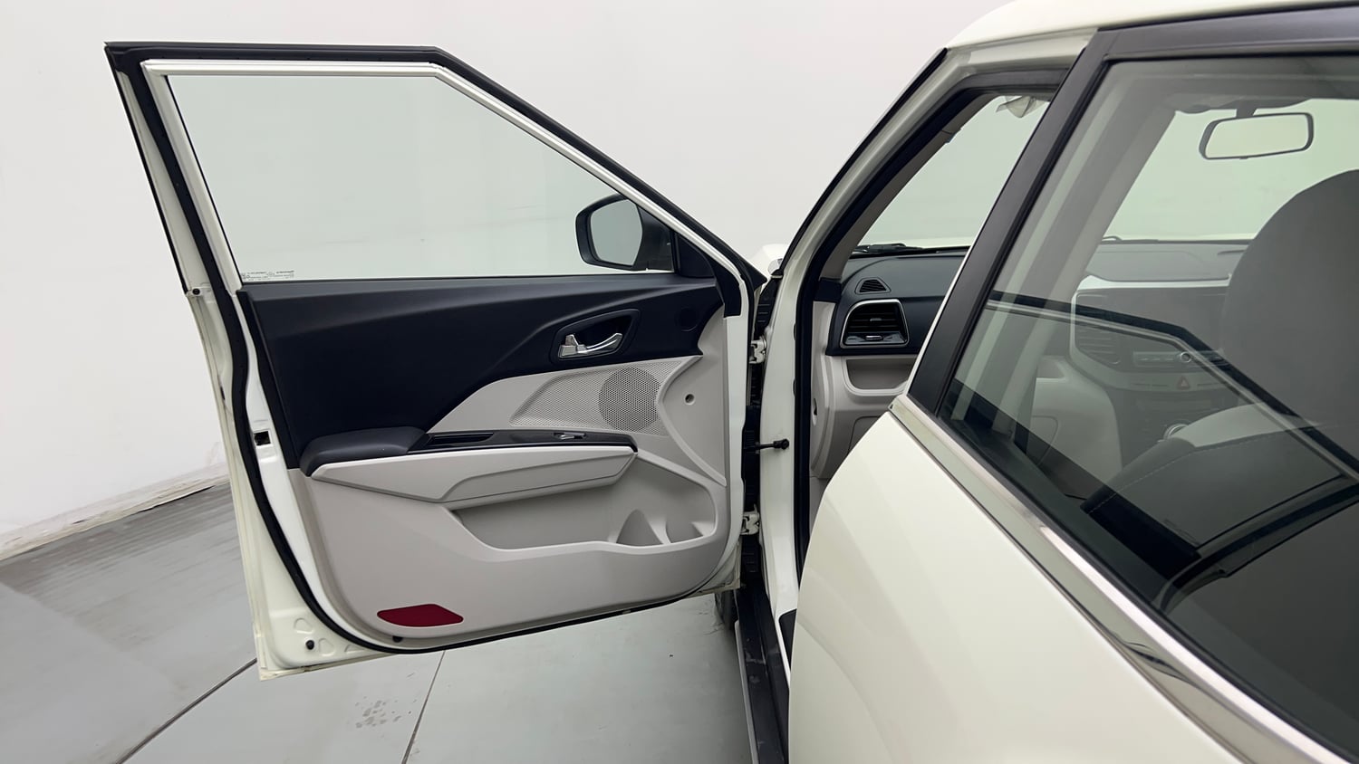 Used 2022 Mahindra XUV 300 W8 1.2 Petrol Petrol Manual interior LEFT FRONT DOOR OPEN VIEW