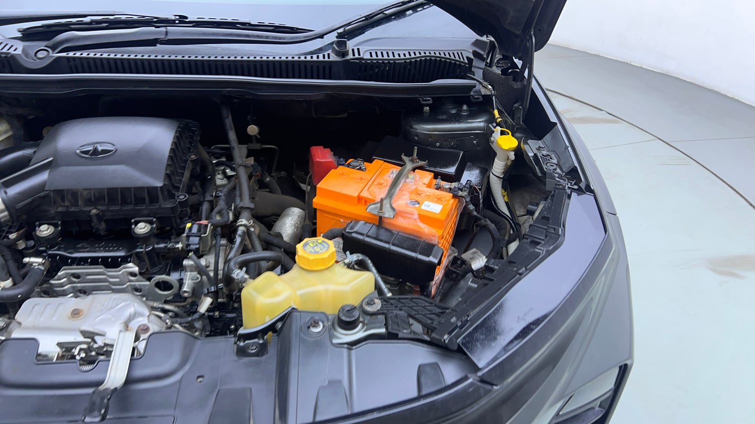 Used 2025 Tata Nexon Fearless Plus S 1.2 Revotron Petrol 7DCA DT Petrol Automatic engine ENGINE LEFT SIDE VIEW