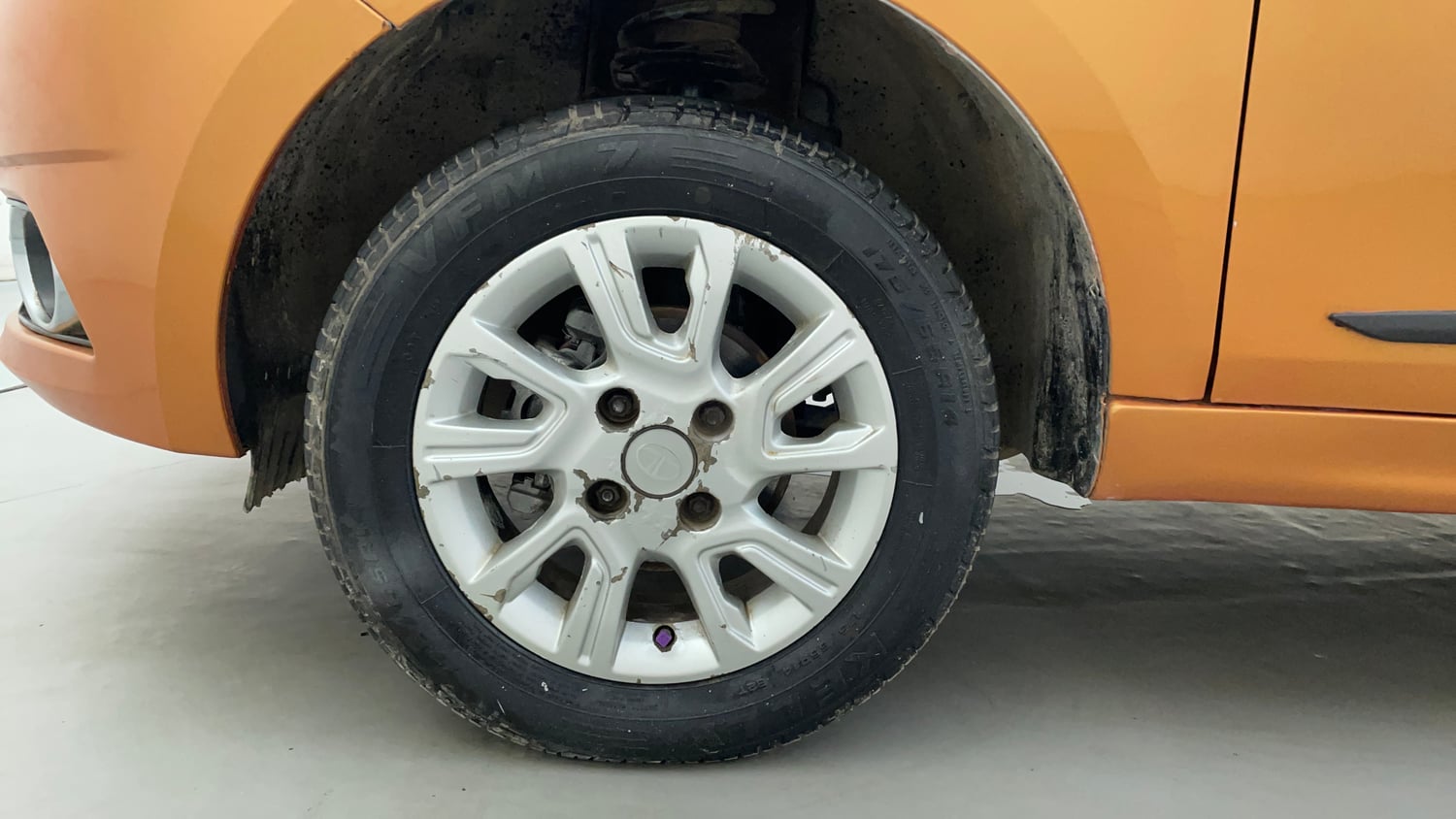 Used 2016 Tata Tiago Revotron XZ Petrol Manual tyres LEFT FRONT TYRE RIM VIEW