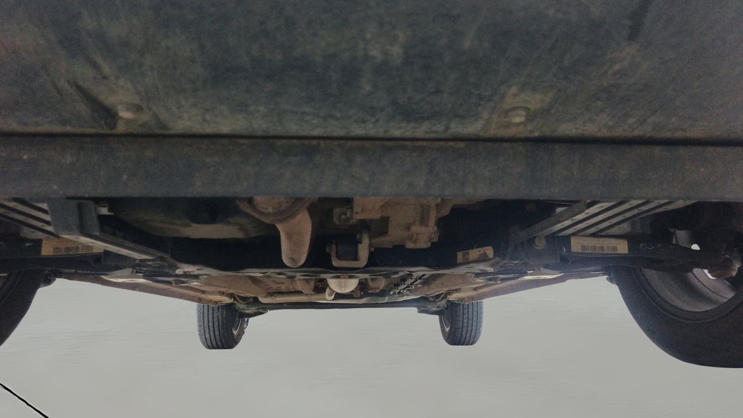 Used 2024 Tata Punch Accomplished Dazzle Pack MT Petrol Manual extra FRONT LEFT UNDERBODY VIEW