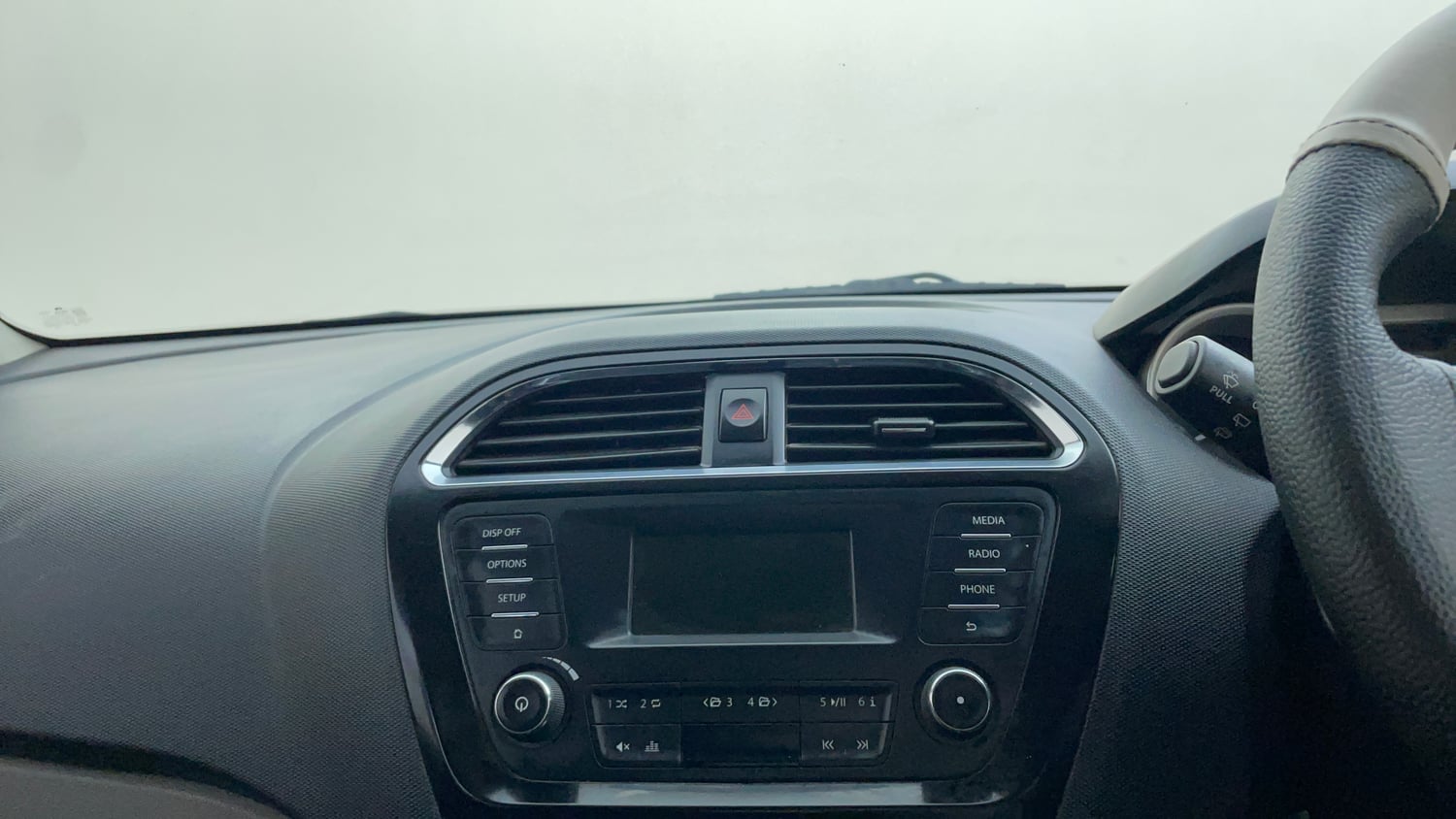 Used 2016 Tata Tiago Revotron XZ Petrol Manual top_features Integrated (in-dash) music system