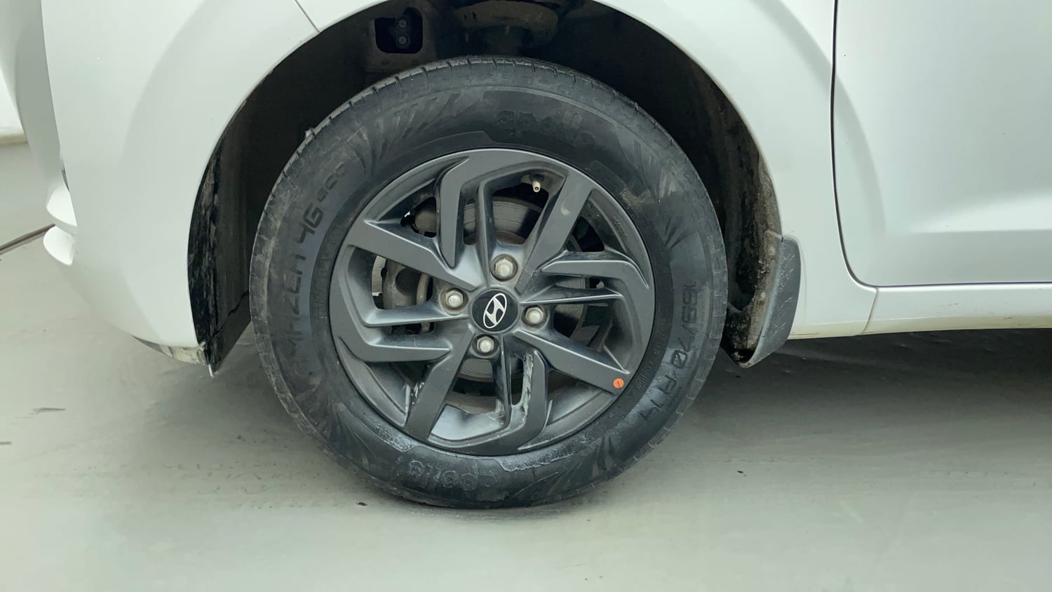 Used 2021 Hyundai Grand i10 Nios Sportz 1.2 Kappa VTVT Petrol Manual tyres LEFT REAR TYRE RIM VIEW