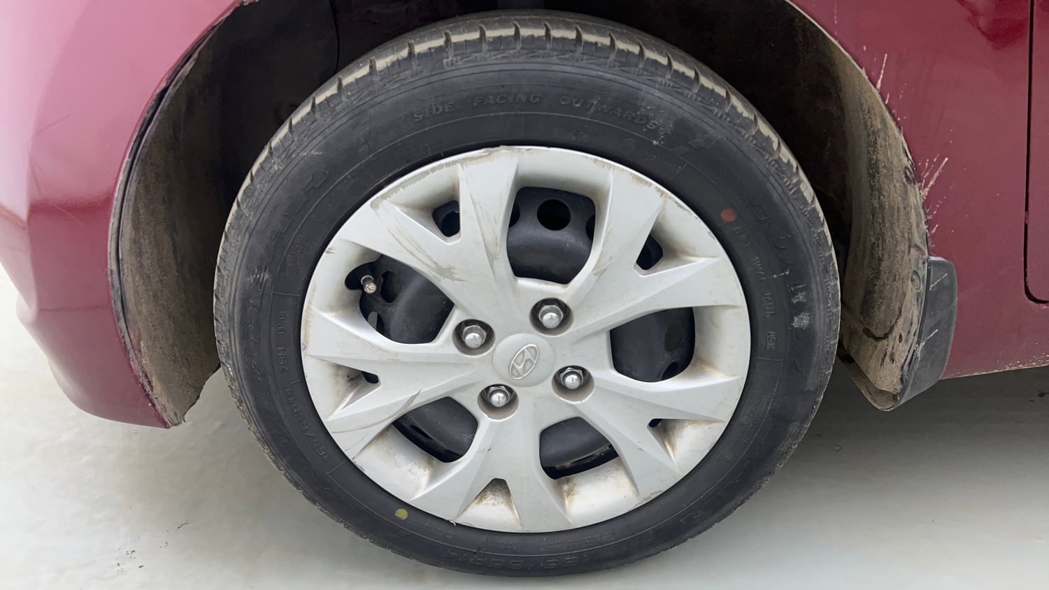 Used 2014 Hyundai Grand i10 Sportz 1.2 Kappa VTVT Petrol Manual tyres LEFT FRONT TYRE RIM VIEW