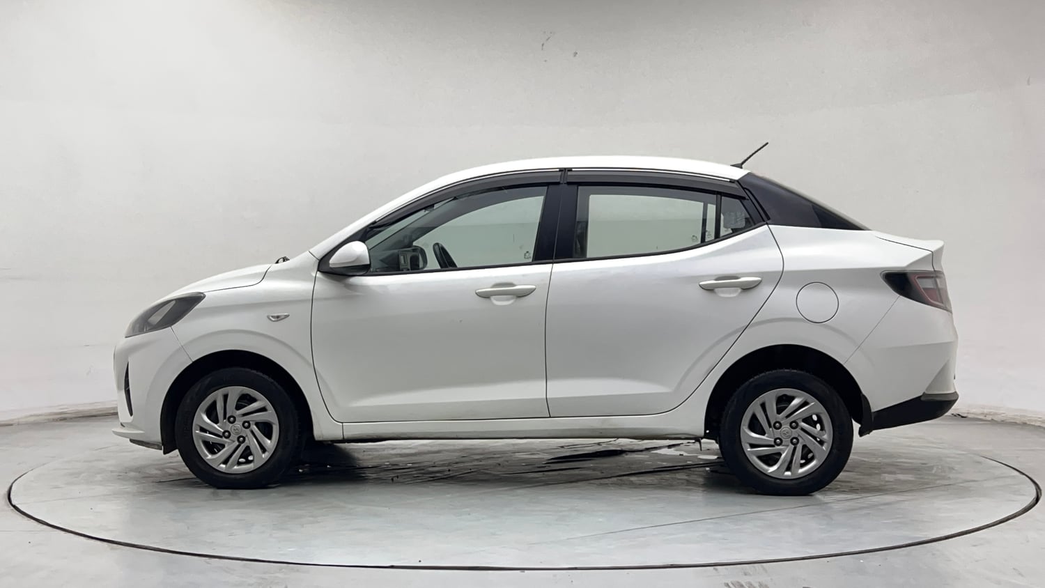 Used 2021 Hyundai Aura S 1.2 CNG Cng Manual exterior LEFT SIDE VIEW