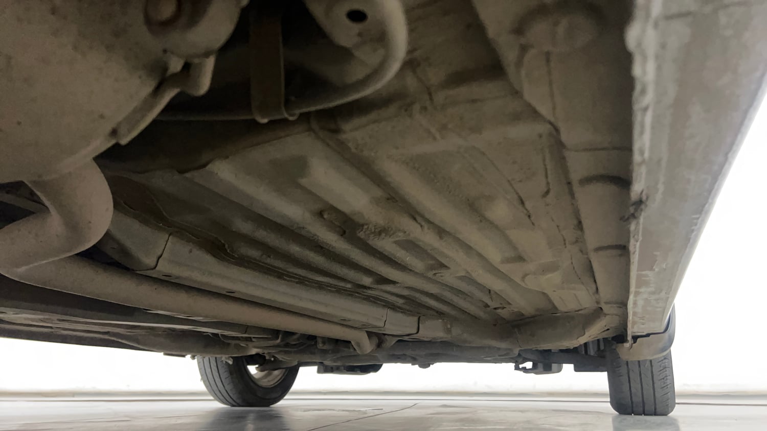 Used 2021 Honda Amaze 1.2 VX CVT Petrol Petrol Automatic extra REAR RIGHT UNDERBODY VIEW