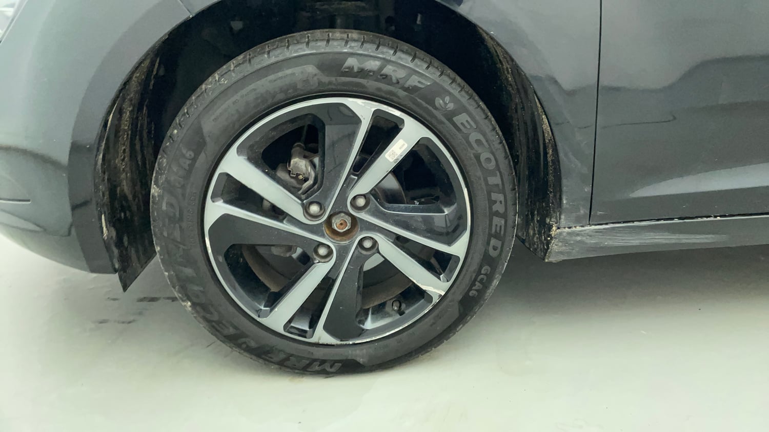 Used 2024 Tata Altroz XZ Plus (S) Dark Edition Petrol Manual tyres LEFT FRONT TYRE RIM VIEW