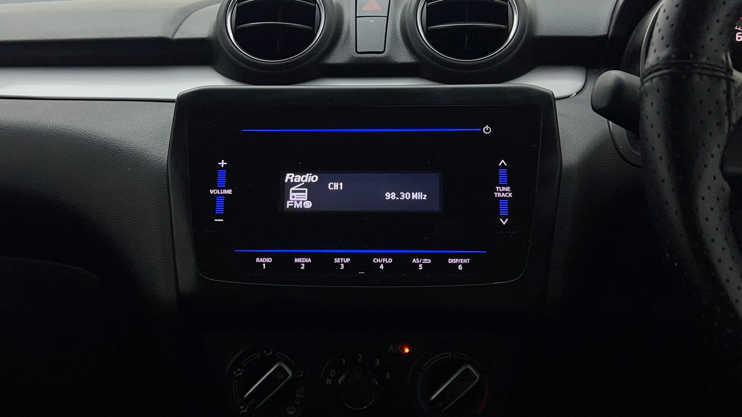 Used 2021 Maruti Suzuki Swift VXi Petrol Manual top_features Integrated (in-dash) music system