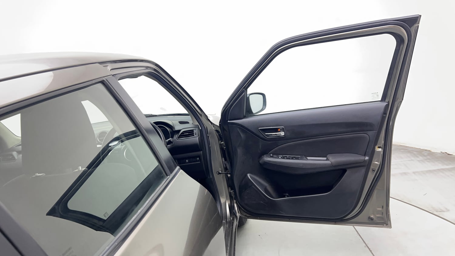 Used 2021 Maruti Suzuki Swift VXi Petrol Manual interior RIGHT FRONT DOOR OPEN VIEW