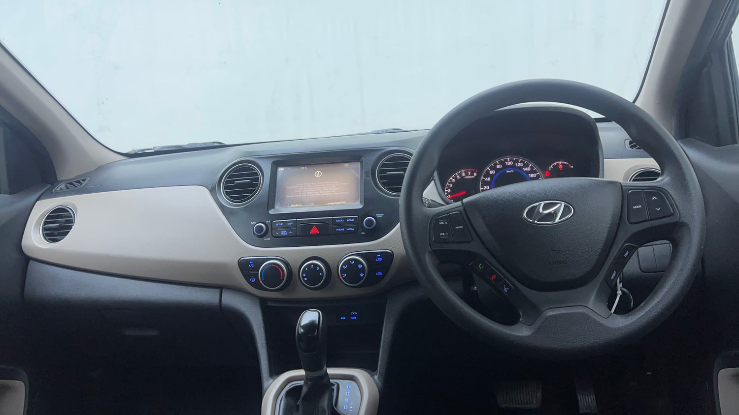 Used 2017 Hyundai Grand i10 Sportz (O) AT 1.2 Kappa VTVT Petrol Automatic interior DASHBOARD VIEW
