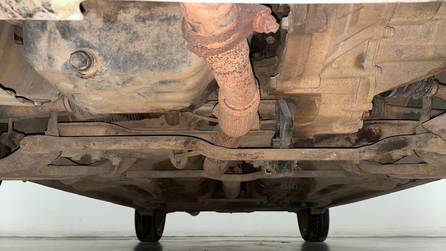 Used 2016 Tata Tiago Revotron XZ Petrol Manual extra FRONT LEFT UNDERBODY VIEW
