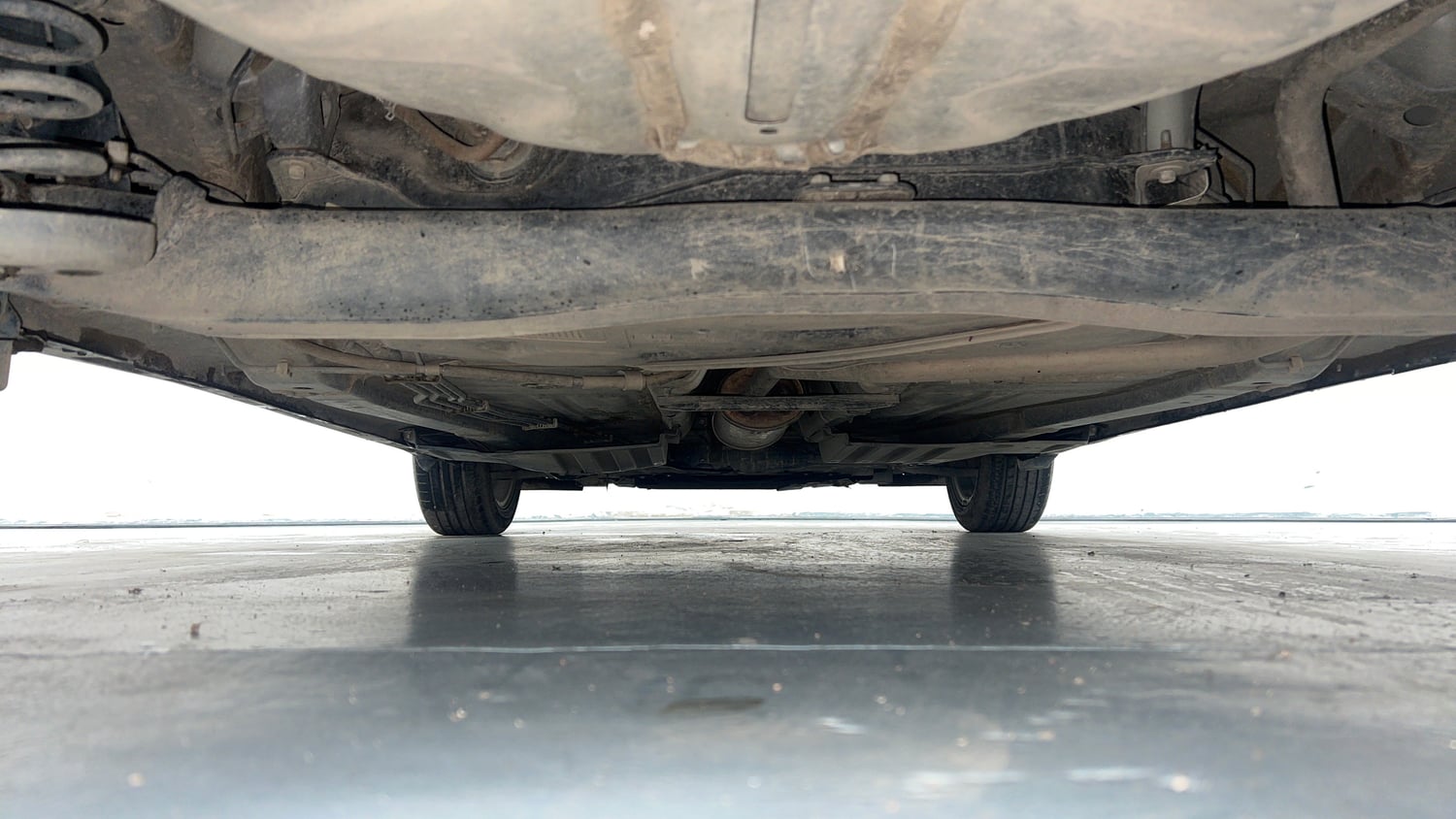 Used 2024 Toyota Glanza V AMT Petrol Automatic extra REAR UNDERBODY VIEW (TAKEN FROM REAR)