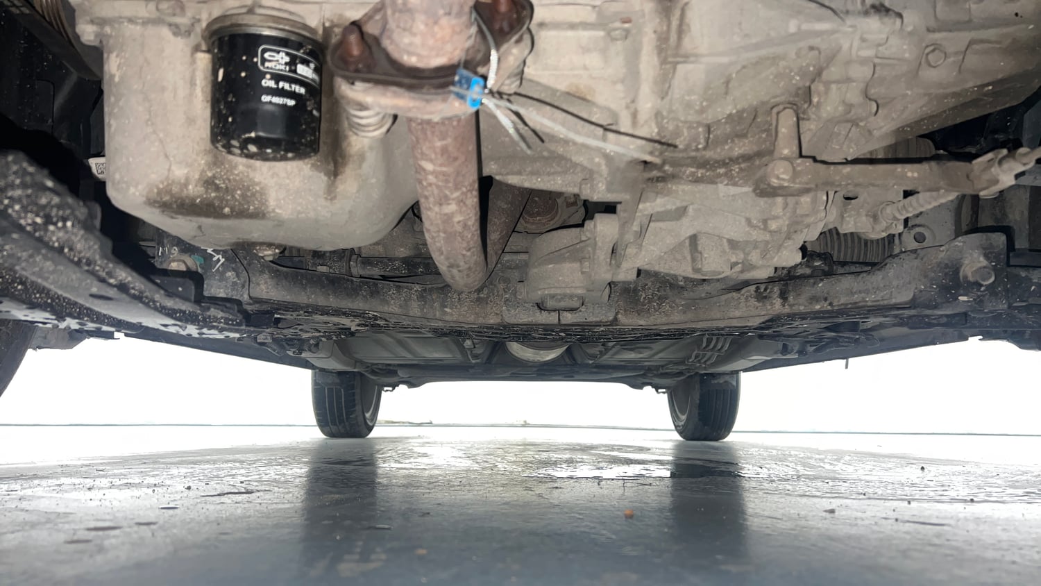 Used 2017 Maruti Suzuki Baleno Zeta 1.2 Petrol Manual extra FRONT LEFT UNDERBODY VIEW