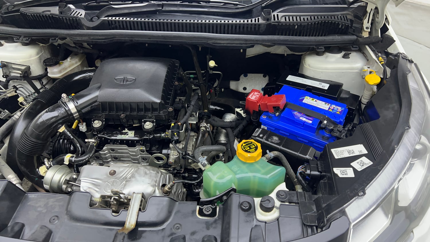Used 2023 Tata Nexon XZA Plus (L) Petrol Automatic engine ENGINE LEFT SIDE VIEW