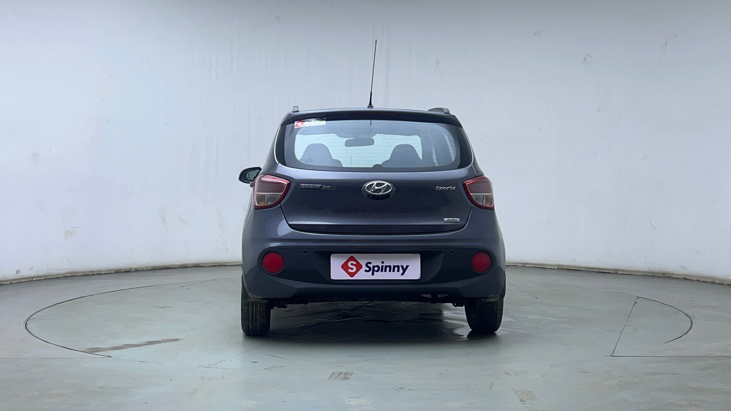 Used 2017 Hyundai Grand i10 Sportz (O) AT 1.2 Kappa VTVT Petrol Automatic exterior BACK VIEW