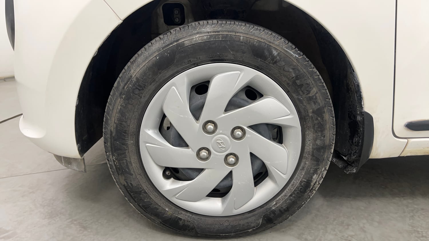 Used 2021 Hyundai Santro Asta Petrol Manual tyres LEFT FRONT TYRE RIM VIEW