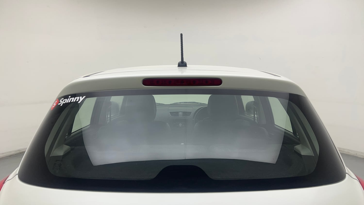 Used 2015 Maruti Suzuki Swift LXi Petrol Manual exterior BACK WINDSHIELD VIEW