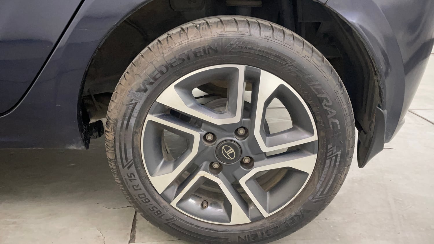 Used 2023 Tata Tiago XZ Plus Petrol Manual tyres LEFT REAR TYRE RIM VIEW