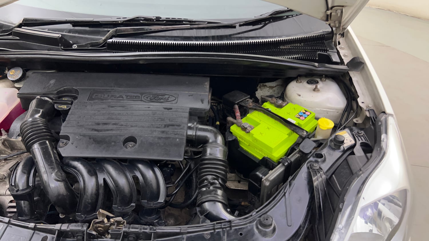 Used 2013 Ford Figo Duratec Petrol Titanium 1.2 Petrol Manual engine ENGINE LEFT SIDE HINGE & APRON VIEW