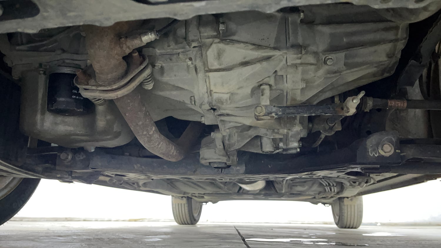 Used 2020 Maruti Suzuki Baleno Zeta Petrol Manual extra FRONT LEFT UNDERBODY VIEW