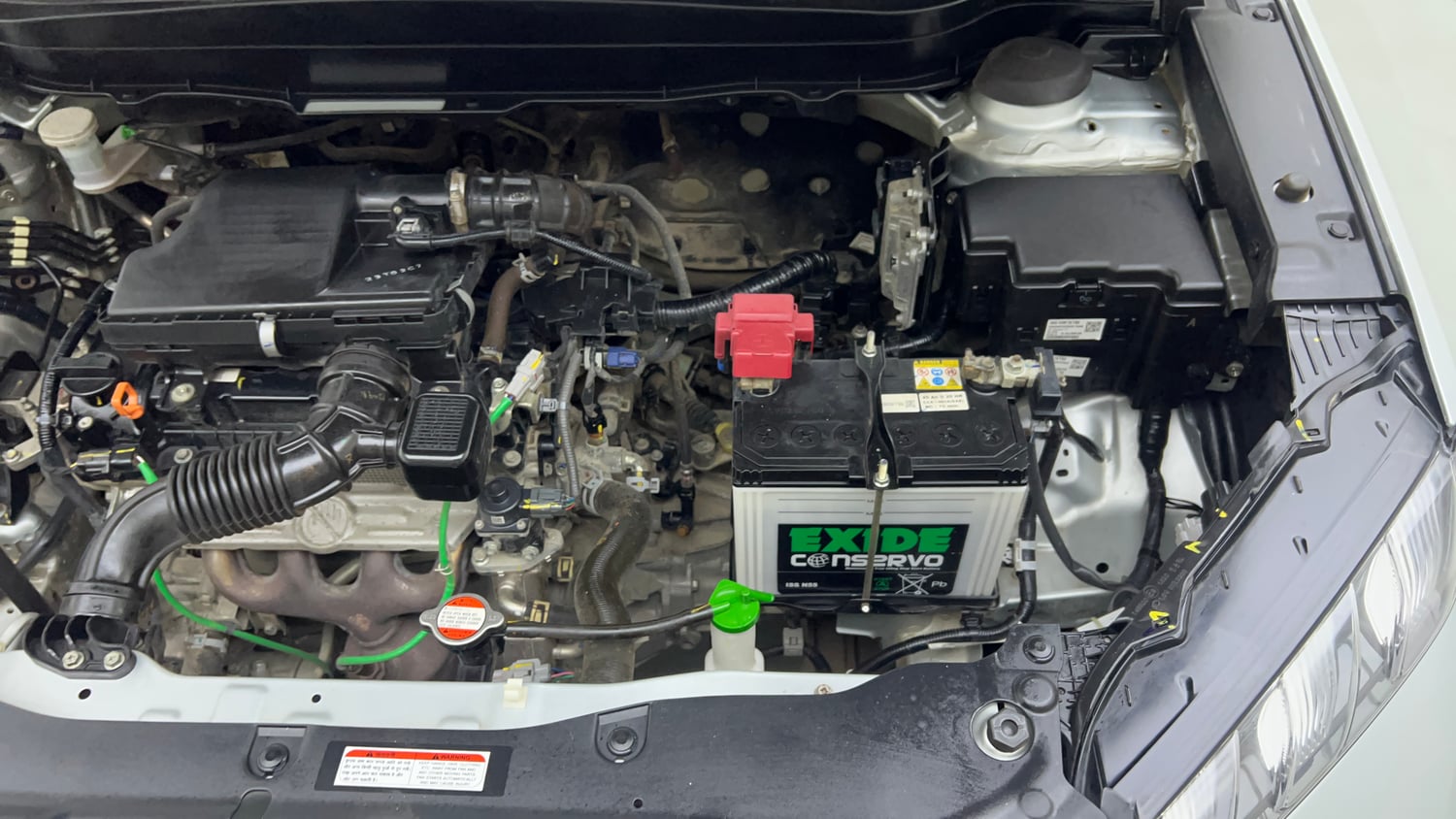 Used 2024 Maruti Suzuki Grand Vitara Delta Smart Hybrid Petrol Manual engine ENGINE LEFT SIDE VIEW