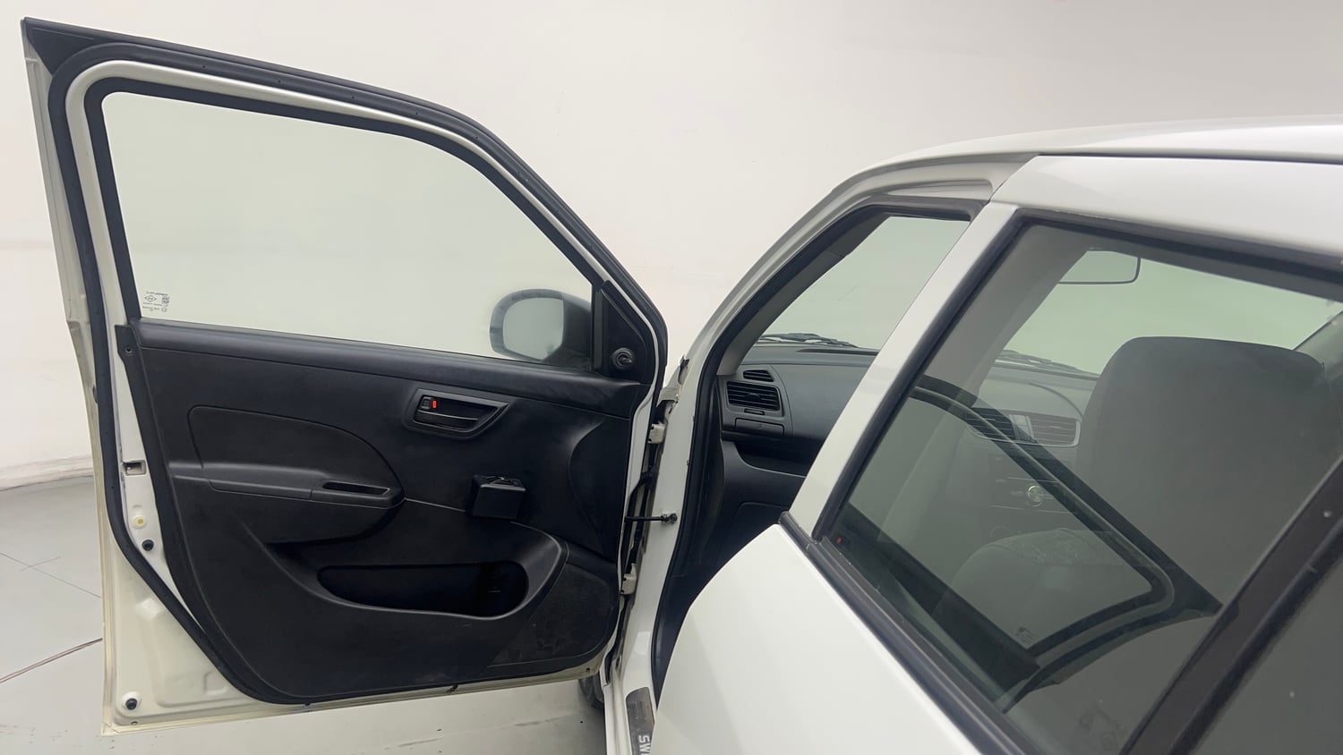 Used 2015 Maruti Suzuki Swift LXi Petrol Manual interior LEFT FRONT DOOR OPEN VIEW
