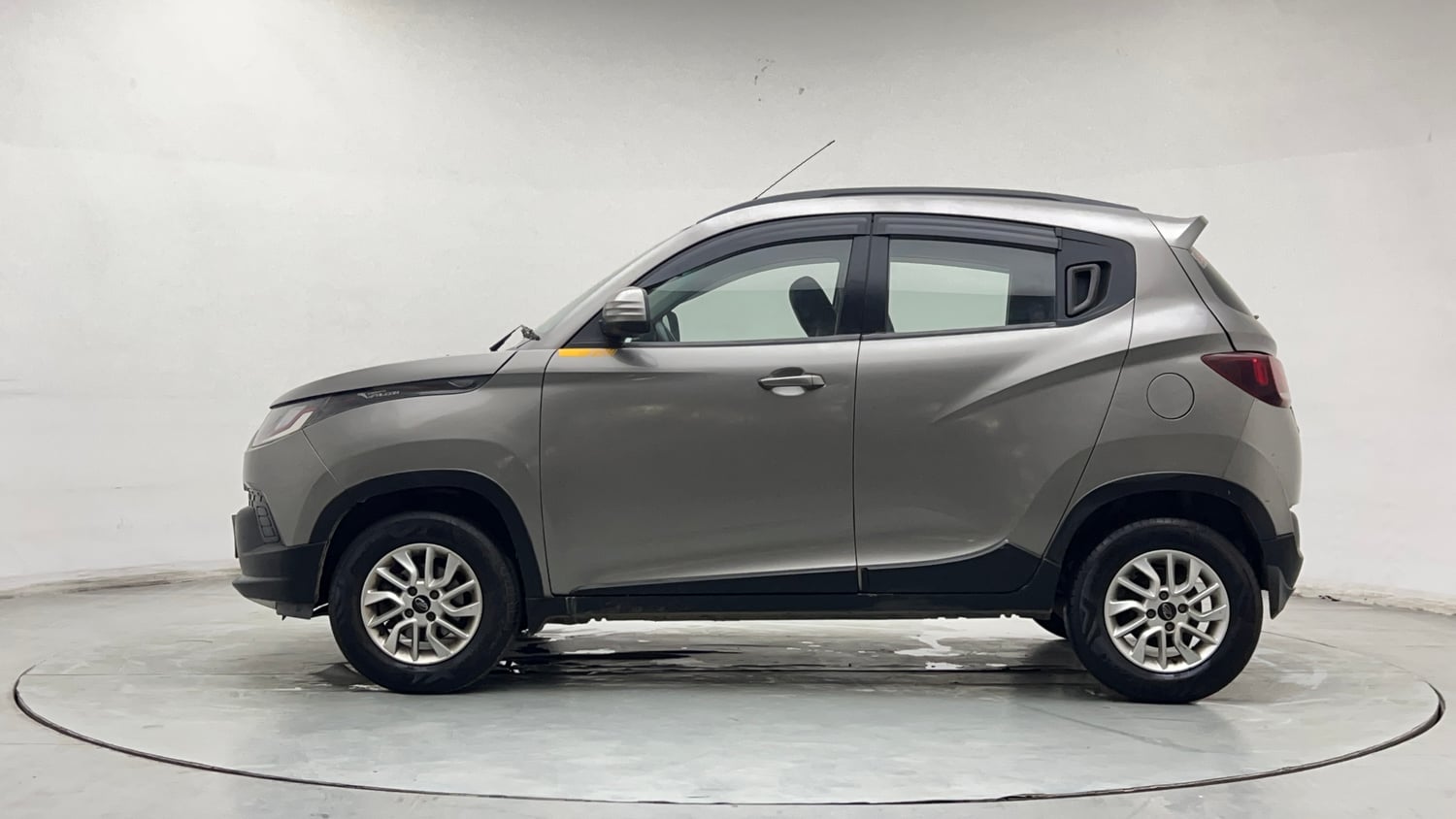 Used 2017 Mahindra KUV100 K6 6 STR Petrol Manual exterior LEFT SIDE VIEW