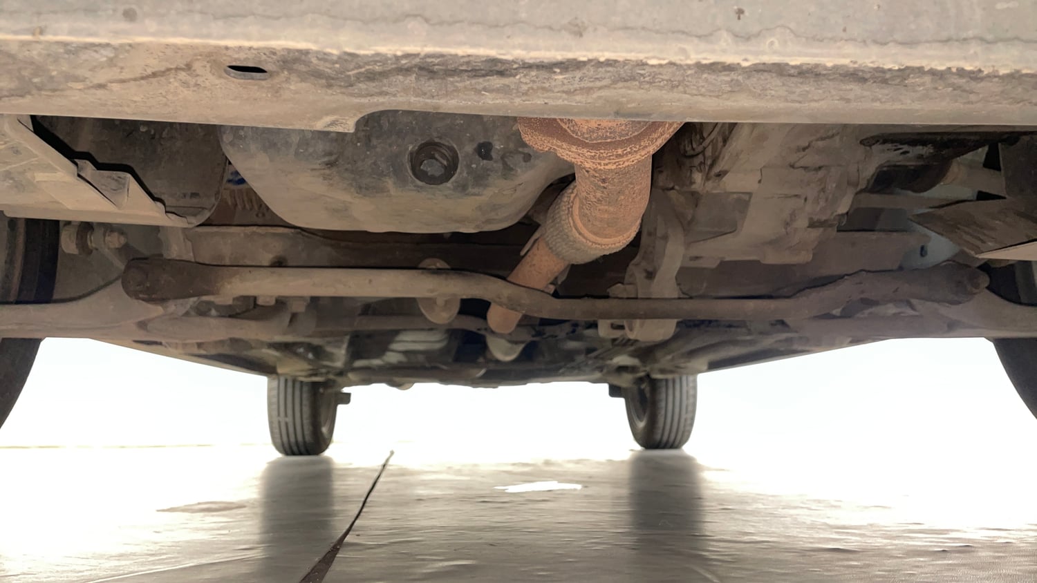 Used 2023 Tata Tiago XZ Plus Petrol Manual extra FRONT LEFT UNDERBODY VIEW