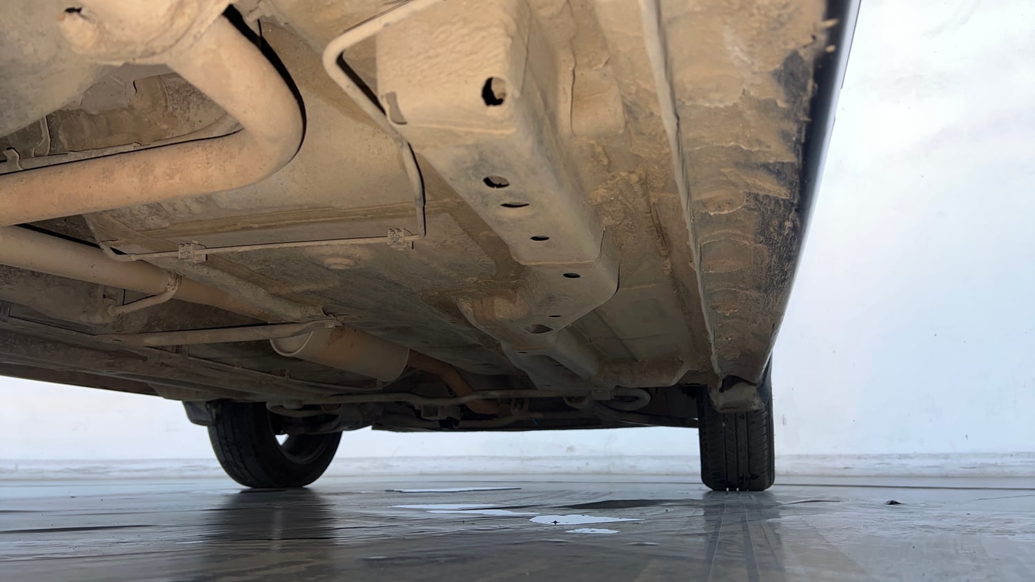 Used 2023 Tata Tigor XZA Plus Petrol Automatic extra REAR RIGHT UNDERBODY VIEW