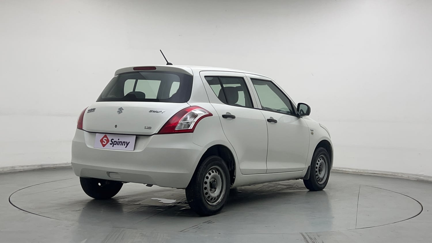 Used 2015 Maruti Suzuki Swift LXi Petrol Manual exterior RIGHT REAR CORNER VIEW