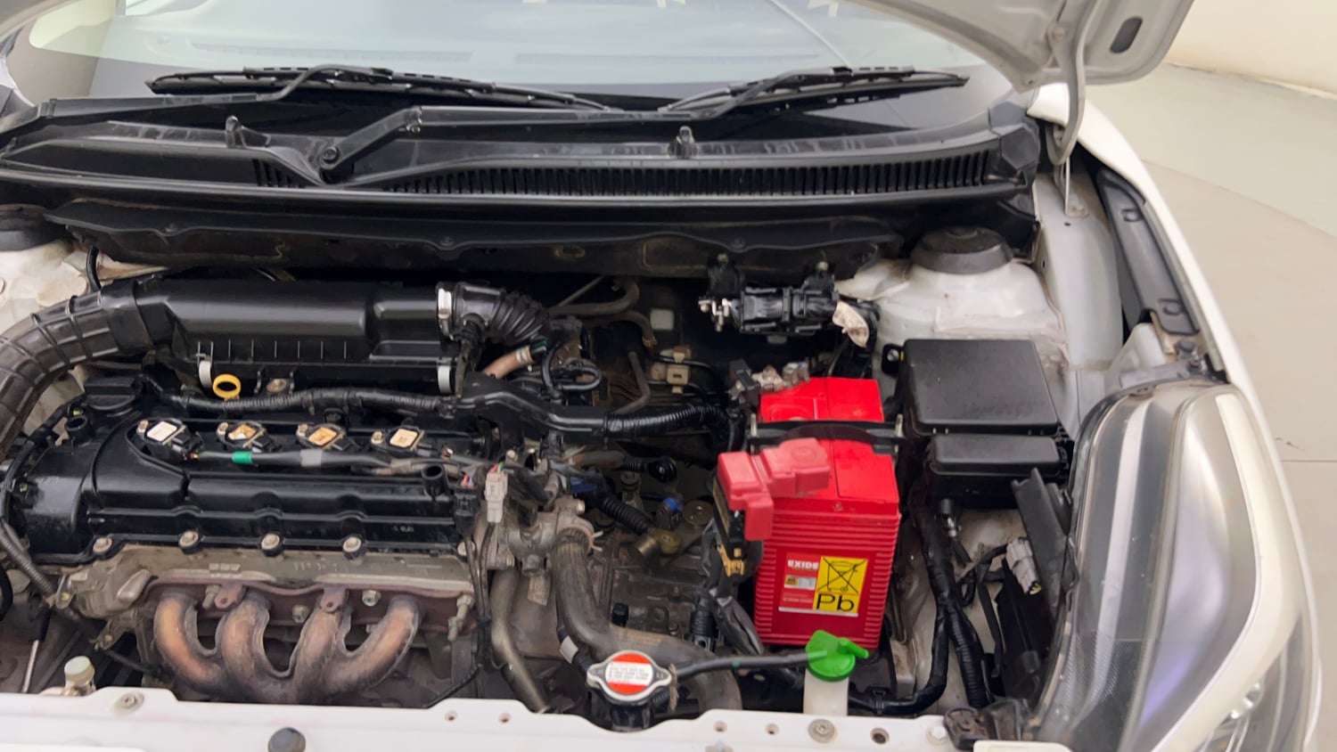 Used 2021 Maruti Suzuki Baleno Delta Petrol Manual engine ENGINE LEFT SIDE HINGE & APRON VIEW