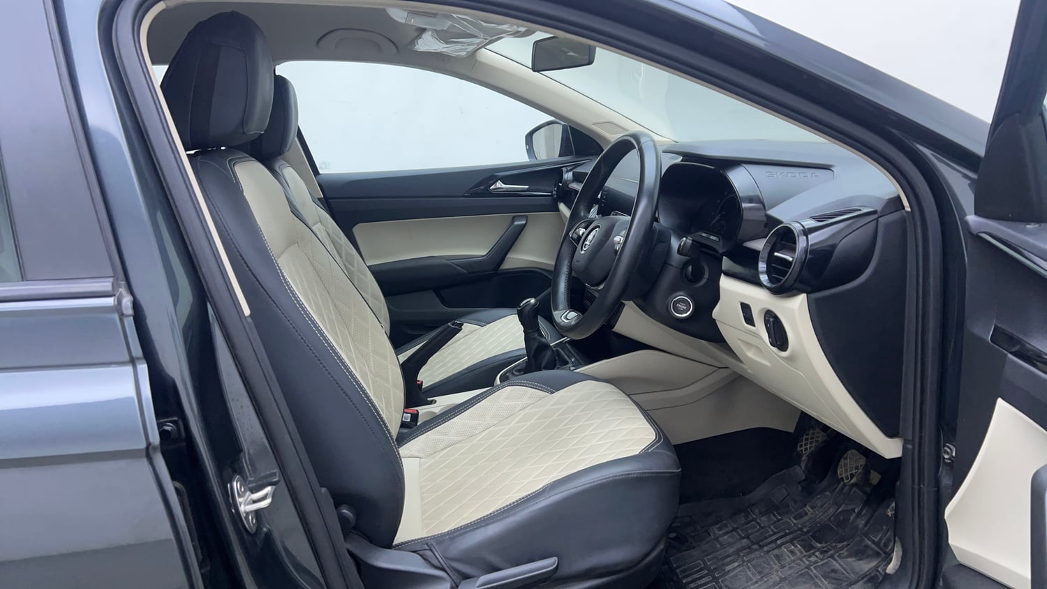 Used 2023 Skoda Slavia Ambition 1.0L TSI MT Petrol Manual interior RIGHT SIDE FRONT DOOR CABIN VIEW