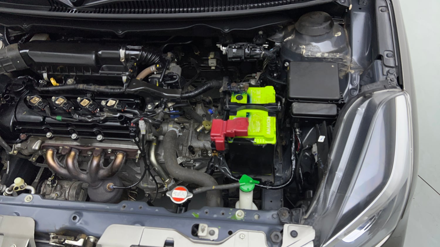 Used 2020 Maruti Suzuki Baleno Delta Petrol Manual engine ENGINE LEFT SIDE VIEW