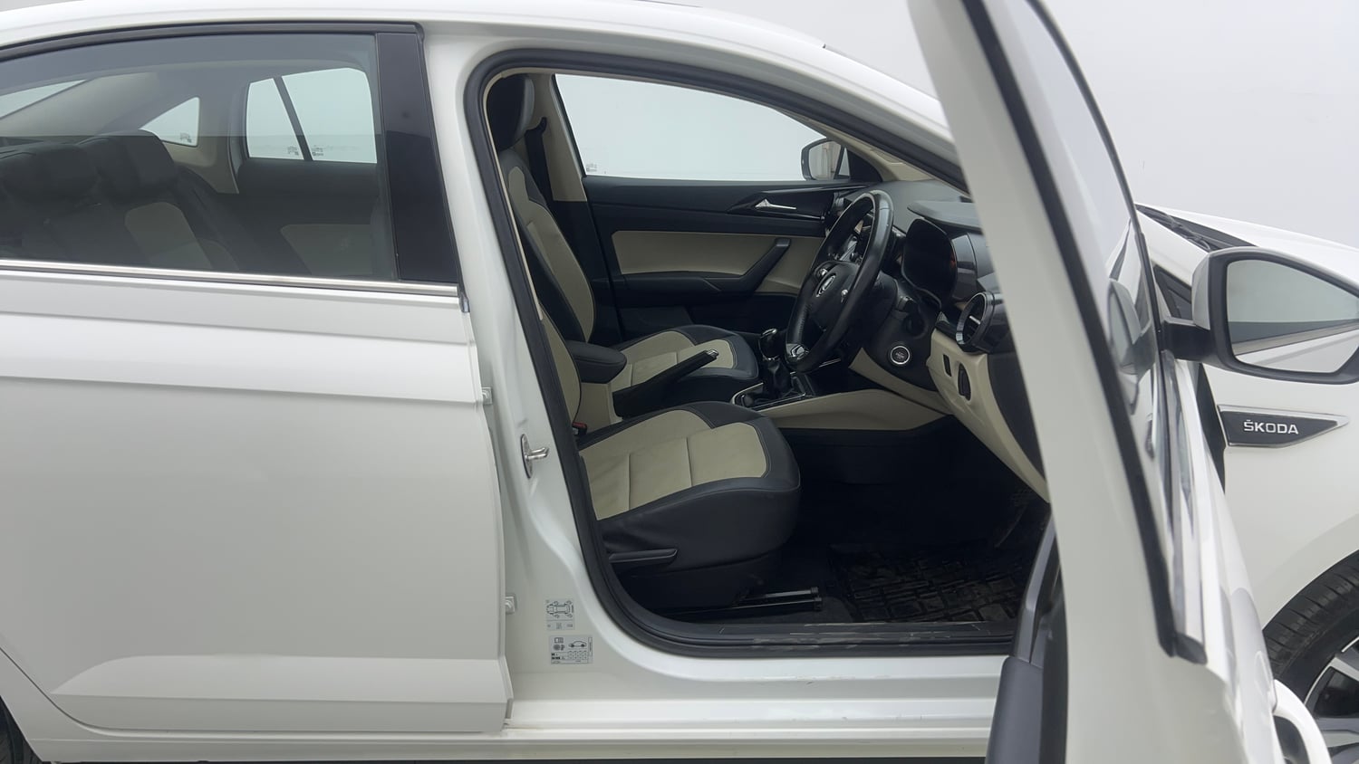 Used 2023 Skoda Slavia Style 1.0L TSI MT Petrol Manual interior RIGHT SIDE FRONT DOOR CABIN VIEW